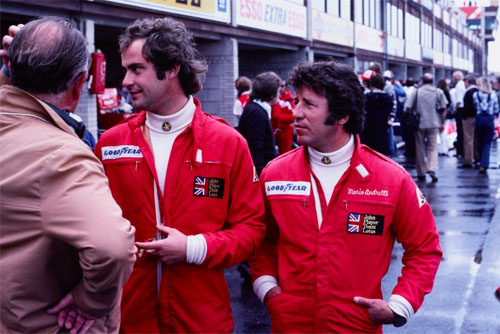 1976 - Gunnar Nilsson and Mario Andretti of JPS Team Lotus in the pits at Zandvoort