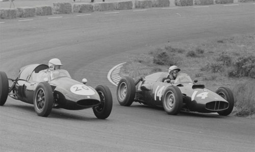 1960 - Jo Bonnier (14) drives a BRM P48 and Carel Godin de Beaufort (20) drives a Cooper-Climax T51 at Dutch GP.