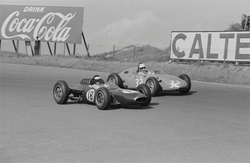 1963 - Dan Gurney drives car number 18, a Brabham-Climax BT7, and Carel Godin de Beaufort drives car number 32, a Porsche 718 at Dutch Grand Prix