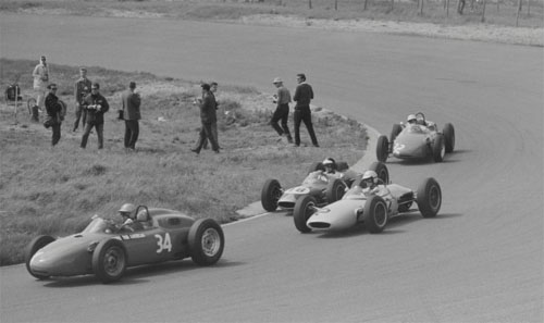 1963 - Gerhard Mitter drives car number 34, a Porsche 718, Jim Hall drives car number 42, a Lotus-BRM 24, Dan Gurney drives car number 18, a Brabham-Climax BT7, and Carel Godin de Beaufort drives car number 32, a Porsche 718